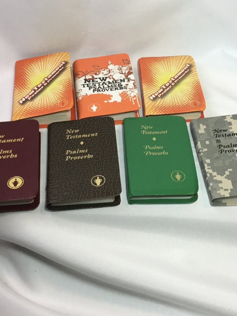7 Pocket Bibles lot of books small Gideon' Bibles Plasms Proverbs New Testament